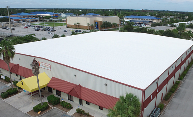 A roofing treasure - Venture Construction Group of Florida helps repair storm-damaged roofs at the YMCA of the Treasure Coast in Florida