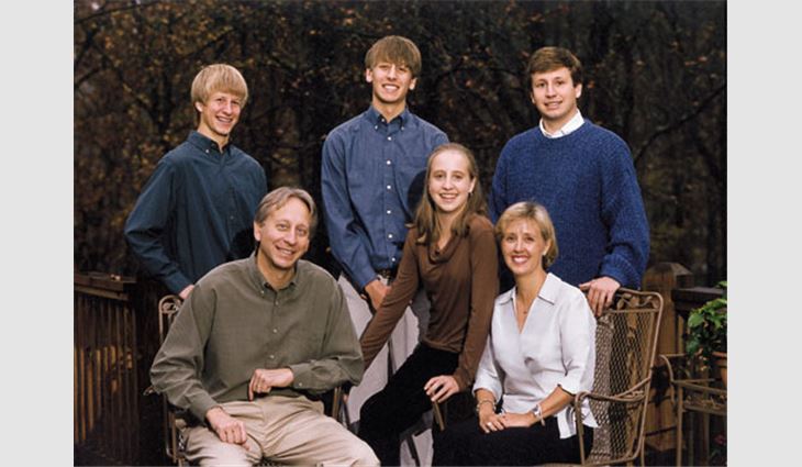 Price with his wife, Sand, and children (from left to right), Bradford, Timothy, Elizabeth and Oscar, at their home in Birmingham, Ala.