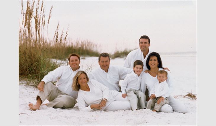 Sutter and his family at Siesta Key Beach in Sarasot, Fla.  From left to right: Brad sutter; Melinda Sutter; Sutter; and Doug and Marsha Sutter with their sons, Christopher and Nicholas.