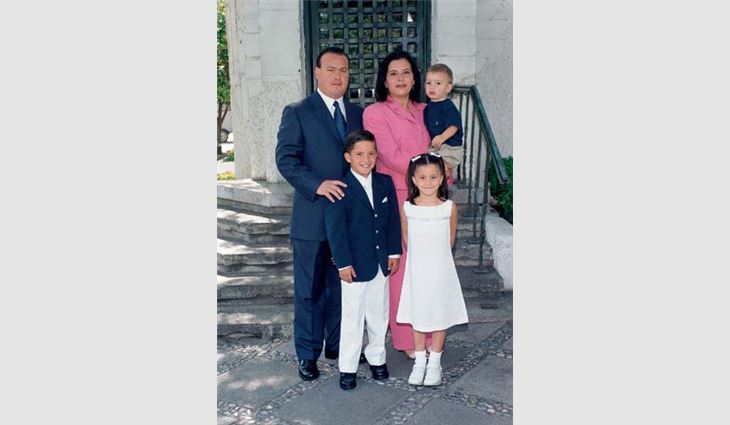 P&eacute;rez outside Santa Engracia Church, San Pedro Garza Garcia, N.L., Mexico, with son Fernando; daughter, Paola; and wife, Claudia, holding son Andr&egrave;s.