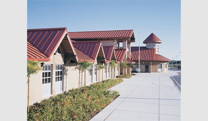 The Robert C. Cooley Middle School, Roseville, Calif., features cone-shaped turret, tapered metal panel and radius roof systems. 