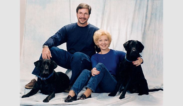 Cutrona, principal and manager of Orange City, Fla.-based General Works Roofing, with her husband, Jerry, and dogs, Lucy and Jackson.
