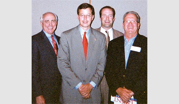 From left to right: Greg Perkins, president of Performance Roof Systems Inc., Kansas City, Mo.; Sen. James Talent (R-Mo.); Eric Kirberg, vice president of marketing for Kirberg Roofing Inc., St. Louis, and chairman of NRCA's Government Relations Committee; and Chris Boland, president of The Quality Roofing Co. Inc., Kansas City.