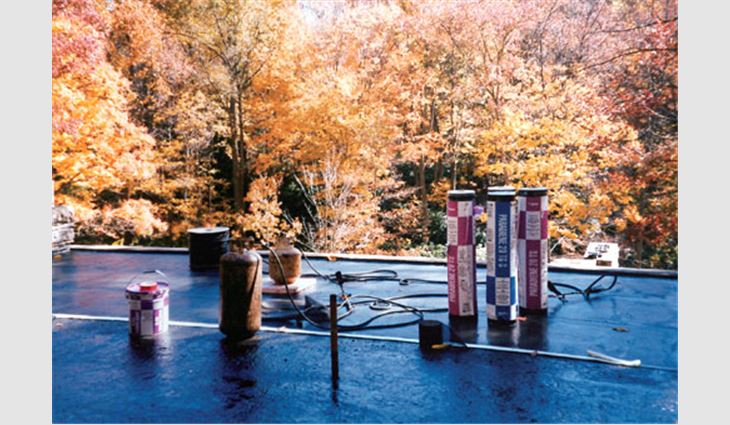 Because of the damp environment in Mill Run, Pa., and Fallingwater's design, which allows water to flow over the building like a waterfall, terraces feature waterproofing materials (above). Fallingwater's low-slope roof systems feature Siplast Paradiene 20 TG S, Paradiene 20 TS, Paradiene 20 EG and Parafor 50 LT. 