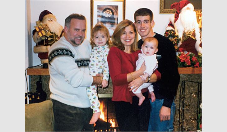 Taylor, president of All-Star Roofing Inc., Amity Harbor, N.Y., with his wife, Rosemary; stepson, Michael; and daughters, Ashley (left) and Olivia.