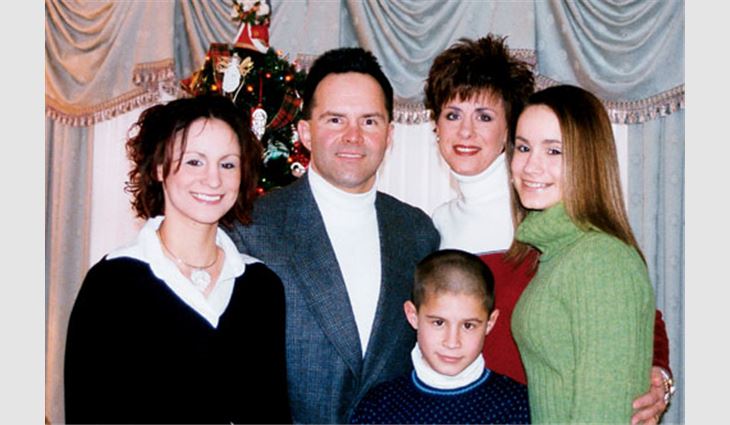 Dunlap, president and chief operating officer of Centimark Corp., Canonsburg, Pa., with his wife, Teri; daughters, Erica (left) and Kimberly; and son, Timothy.
