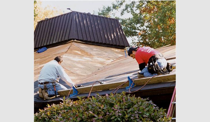 Roofing workers donate their time to reroof the Sargent Rehabilitation Center, Warwick, R.I.