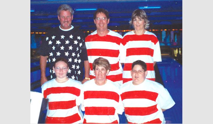 Phoenix-based Star Roofing's employees dressed as the stars and stripes during a fundraiser to benefit the Greater Phoenix Youth At Risk Foundation.