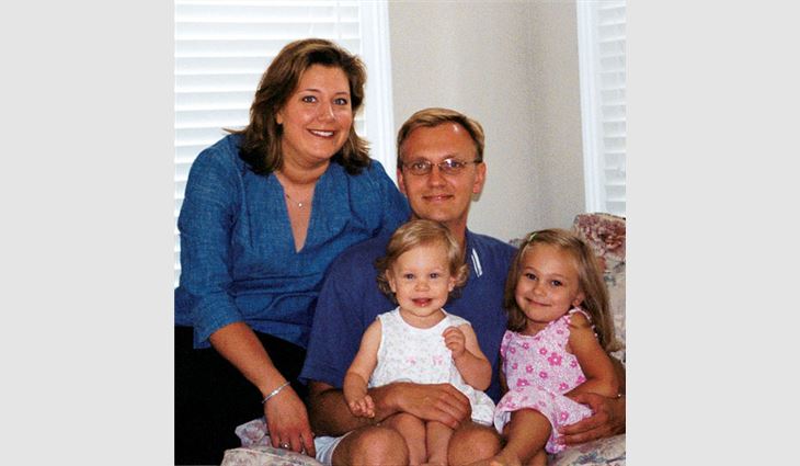 Bondarowicz, vice president of Smart Roofing Inc., Chicago, with his wife, Cathy, and daughters, Faith (left) and Hanna.