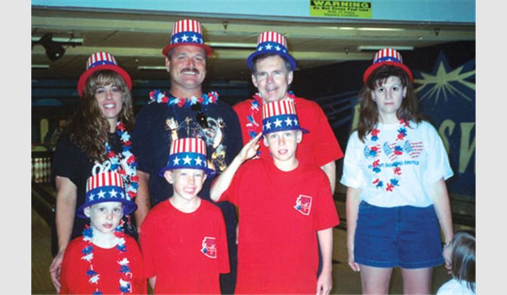 Phoenix-based Kachina Roofing dressed patriotically during the Arizona Roofing Contractors Association's bowling tournament that benefited the Greater Phoenix Youth At Risk Foundation.