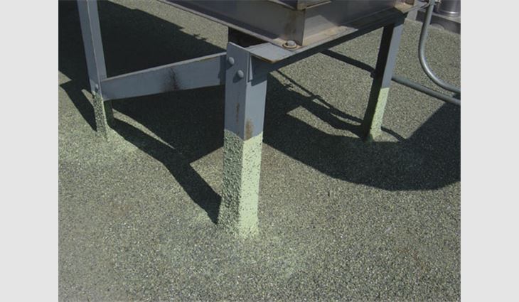 SPF roof systems often were found to have no need for pitch pans or separating support columns that are structurally sound and tied to a roof deck. This photo shows a heavy steel angle support stand that is directly flashed with SPF and coating into the SPF roof system. The 1992 flashing installation appears to be watertight and serving its purpose.