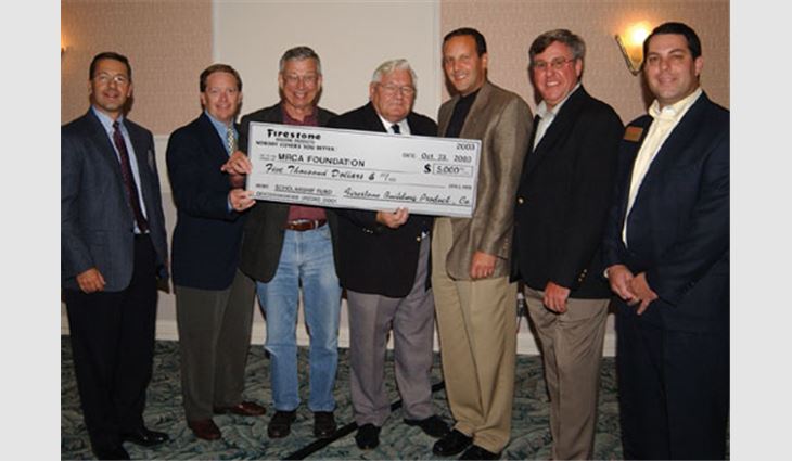 Pictured from left to right: Robert Delaney, vice president of sales for Firestone Building Products; Cliff Johnson, board member of MRCA's foundation; John Drew, treasurer of MRCA's foundation; James Mansfield Sr., board member of MRCA's foundation; David Tilsen, president of MRCA's foundation; James Eckstein Jr., vice president of MRCA's foundation; and Tom Walker, national sales manager for Firestone Building Products.