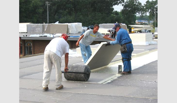 These photos show the use of thermal insulation. Tapered insulation, in an effort to optimize thermal performance, can greatly reduce heating and cooling costs during the lifetime of this roof system and building. Benefits only will increase as energy costs continue to rise (the installation meets tenets 8, 9, 15 and 16).