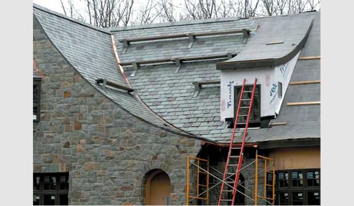 A new slate roof under construction in Madison, Wis.