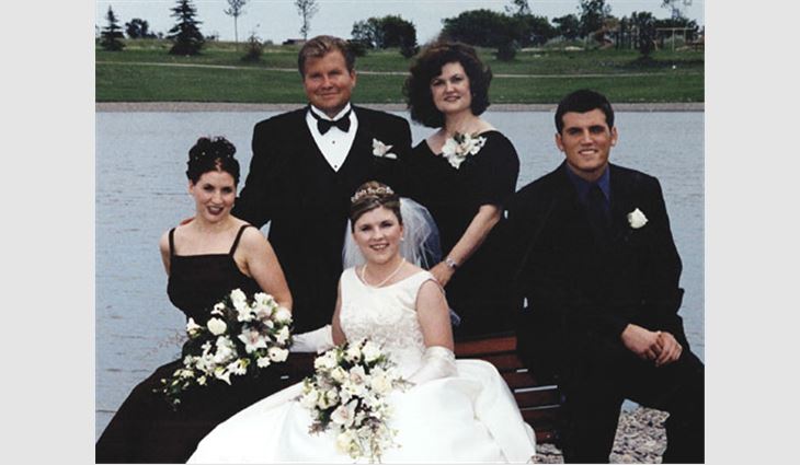 Ed Gallos, president of Master Roofing Ltd., Winnipeg, Manitoba, with his family. Pictured left to right: daughter Jessica, Gallos, daughter Marcia, wife Ramona and son Adam. 

