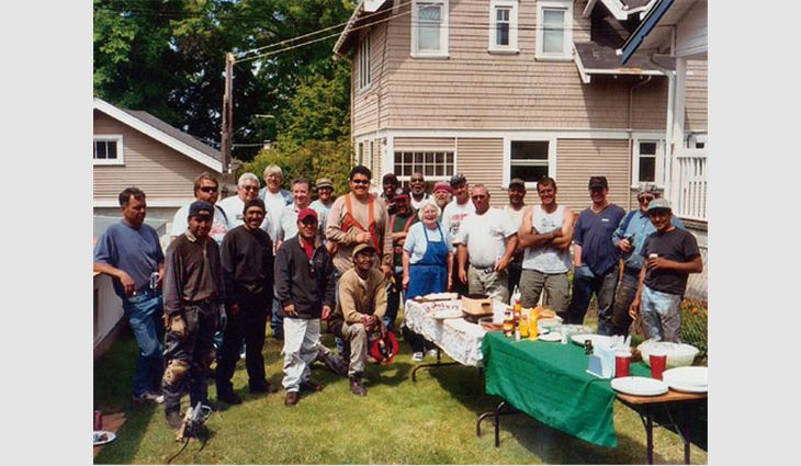 Roofers Local 54 in Seattle came to the aid of Patti Metcalfe, a widow whose house was in need of a new roof system. To show her appreciation of the crew's work, Metcalfe made them lunch every day.