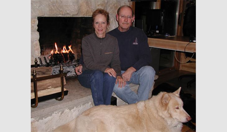 Helen Hardy Pierce, director of contractor services for GAF Materials Corp., Wayne, N.J., with husband Riley and dog Kody.
