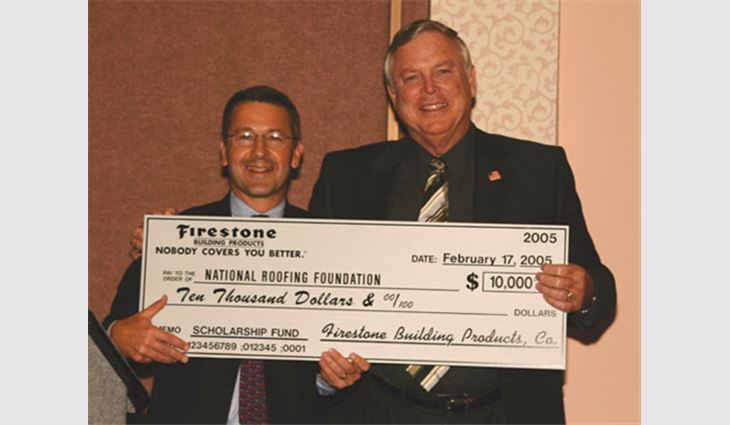 Pictured from left to right: Robert Delaney, vice president of sales and marketing for Firestone Building Products Co., Indianapolis, and Larry Reardon, vice president of the National Roofing Foundation's Board of Trustees.
