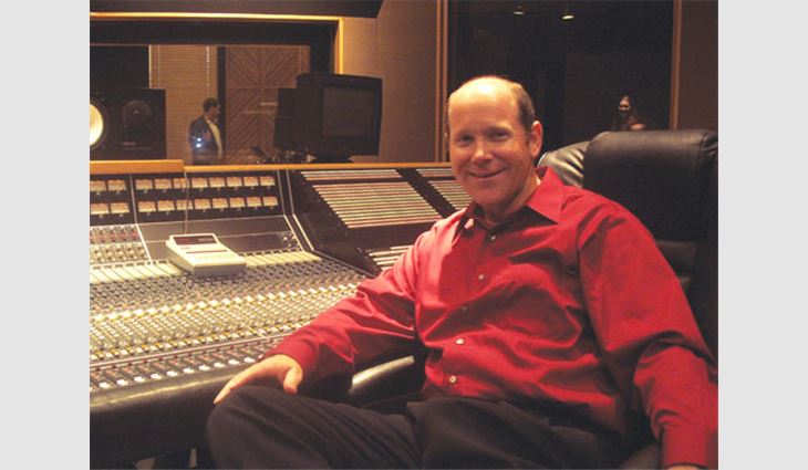 Ribble sits at the sound board of the Sound Kitchen, a recording studio in Nashville, Tenn.