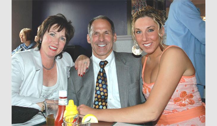 Giese, president of Jim Giese Roofing, Dubuque, Iowa, with wife Cathy (left) and daughter Carolyn (right).

