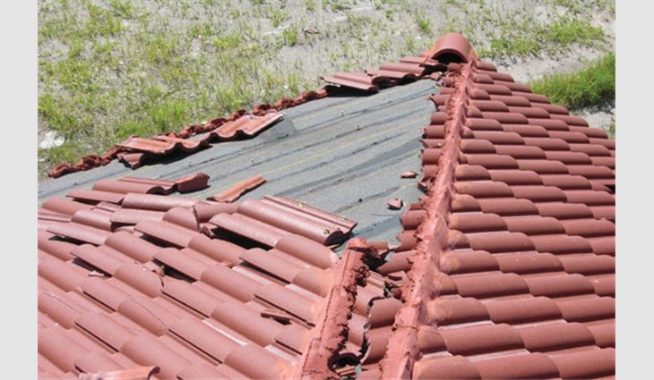 Photo 5: This new mechanically attached tile roof lost several tiles.