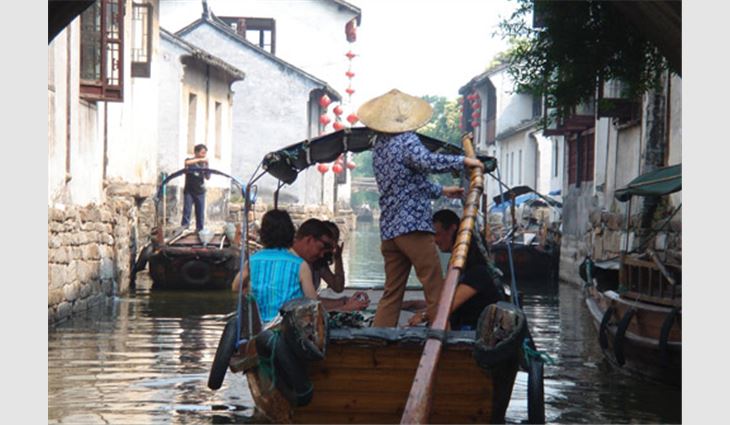 NRCA members ride a gondola in Suzhou, a small town outside of Shanghai, China.