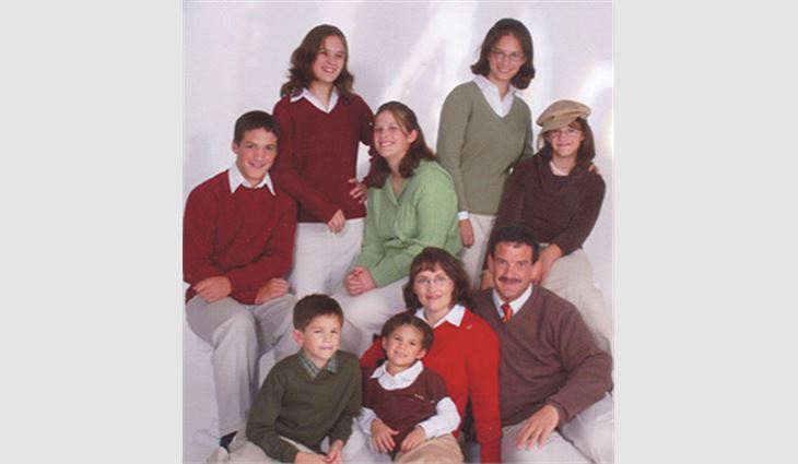 Pictured counterclockwise: Kulp, daughter Aliya, daughter Jarita, daughter Camara, daughter Raquel, son Robert, son Anthony, daughter Tikvah and wife Laura.
