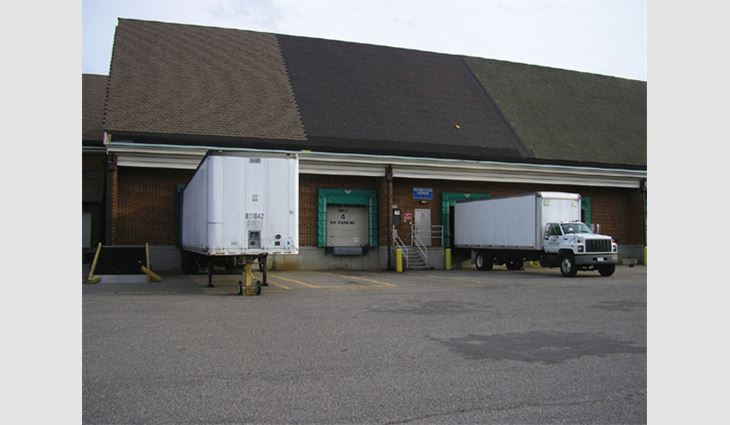 The company had to work around the building's loading dock; the roofing crew tears off the old cedar shakes on the main entrance of the CBN support center; special staging was required to work around large transmission satellites. 