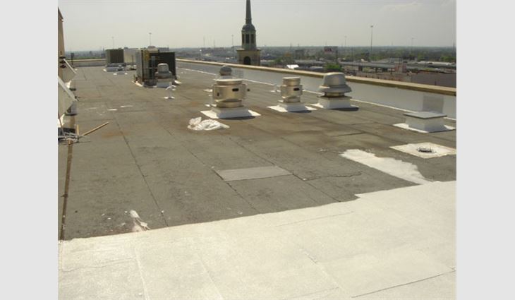 Photo of a roof system restoration before a biobased coating was installed on Baptist Medical Center's surgical wing in San Antonio