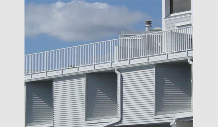 Removal of this balcony railing was required at the beginning of the project, so Potteiger-Raintree installed a temporary railing to eliminate fall hazards.