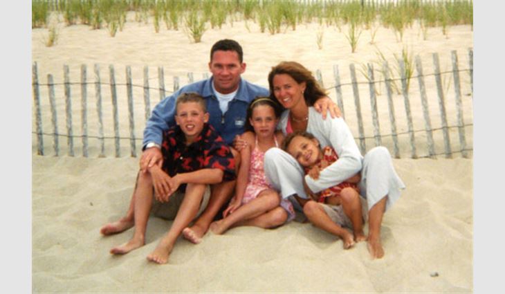 Pictured clockwise: Craft with his wife Julie, son Sam, daughter Erin and son Ryan in Cape Cod, Mass.