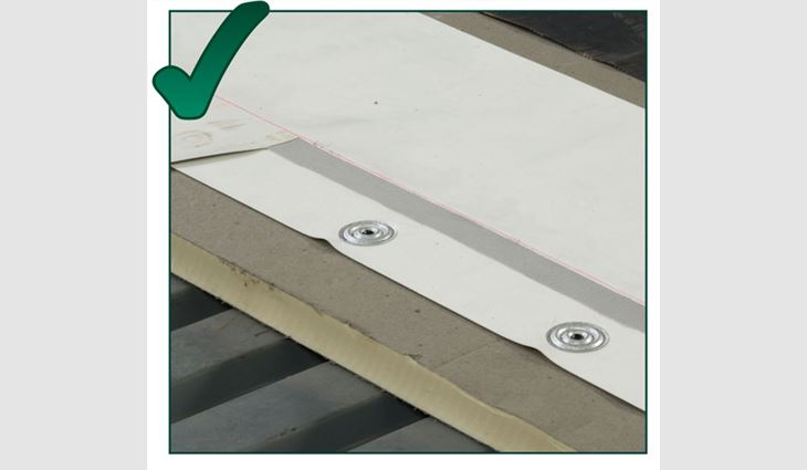 This photo shows proper placement of fasteners for PVC and TPO membranes. Fasteners should be placed behind the seam (12 inches on center) and screwed into the top of the steel flute. Fasteners and plates should be installed a minimum of 1/2 of an inch from a membrane's edge and screwed into a metal deck's top rib.