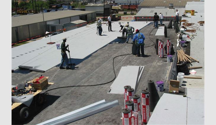 Ordinary roofing job sites, such as the one pictured, have the potential to produce hazardous wastes. 
