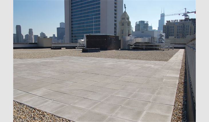 Photo 4: Ballast coverage of 17 pounds per square foot or greater and concrete pavers provide greater benefits than cool roof membranes.