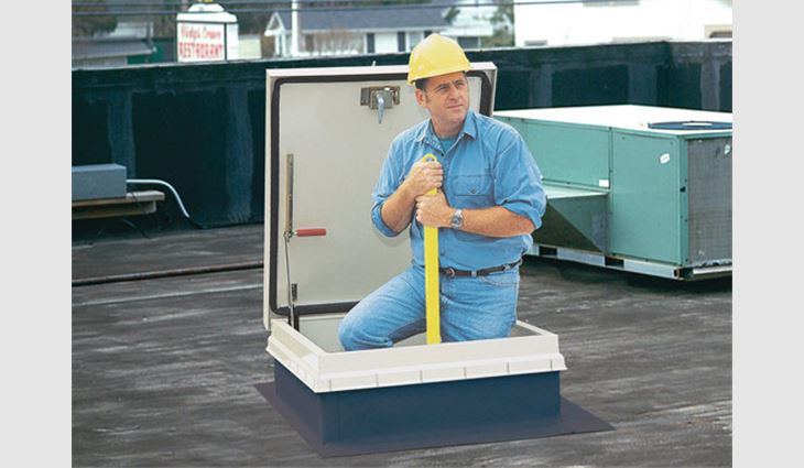 A ladder access hatch with a retractable safety post can be attached to a fixed ladder. The post provides a positive handhold for workers entering or exiting the hatch.