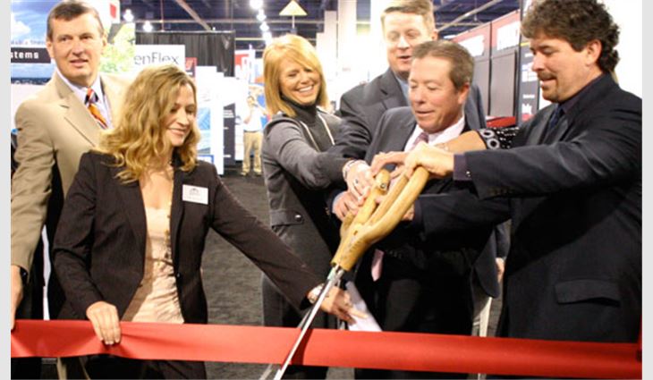 The trade show opens with the traditional ribbon-cutting ceremony; pictured from left to right; NRCA Executive Vice President Bill Good; Donna Bellantone, director of Hanley Wood Exhibitions; Kelly Daly; NRCA Senior Vice President Bob Therrien; NRCA President Bob Daly; and RIck McConnell, vice president of Hanley Wood Exhibitions.