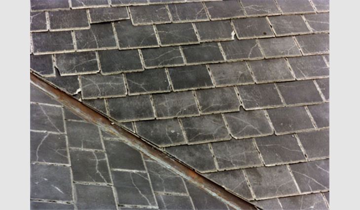 Photo 4: A majority of these artificial slate pieces are cracked.