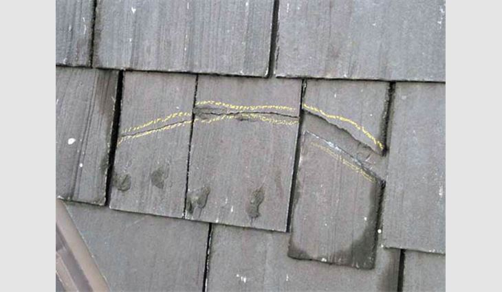Photo 8: If shingle products didn't curve upward, they cracked.