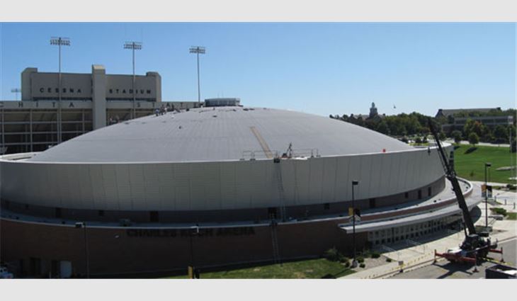 Charles Koch Arena during various stages of reroofing