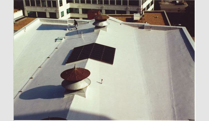 A 14-year-old built-up roof system after coating. The roof, coated in 1996, was recoated within the next five years to extend the coating's life.