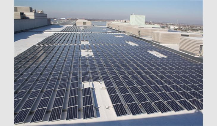 Rack-mounted monocrystalline PV panels on the convention center's roof