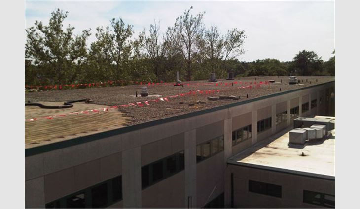 Wilson Middle School's existing roof system before R.K. Hydro-Vac removed the stone ballast