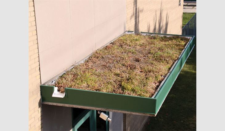 A vegetative roof system installed on one roof section