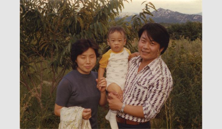 Lee with his parents