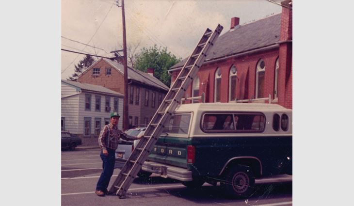 Heilinger prepares to inspect a slate roof system on a church in Marietta, Pa., in the late 1980s.