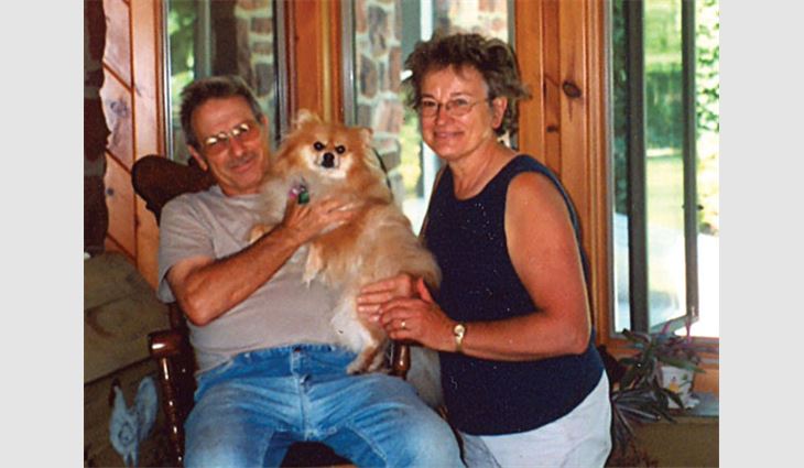 Heilinger with his wife, Jo, and their dog 