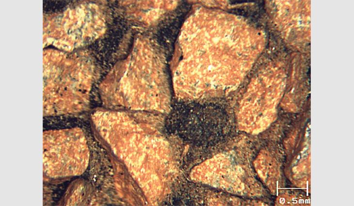 Photo 4: The surface of a three-year aged shingle with solar-reflective granules