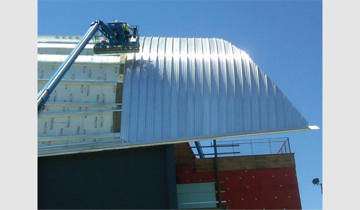 The roof was covered with a structural metal panel roof system of 0.040-inch-thick mill-finished aluminum.