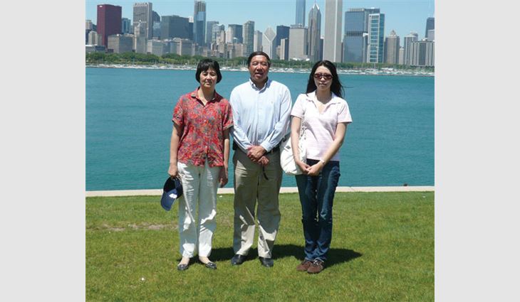 Dongqing with his wife, Tong Xiaoqiu, and daughter, Sabrina, in Chicago