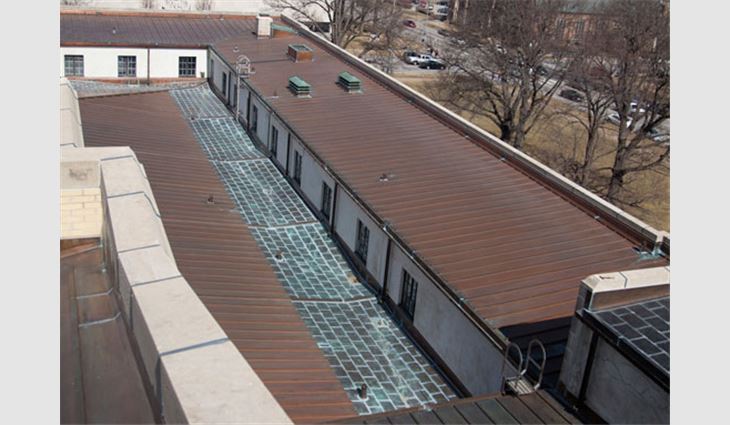 Midland Engineering fabricated and installed 20-ounce batten-seam and soldered flat-seam copper panels on the building's four quadrants, each of which has four to five roof areas of varying levels.